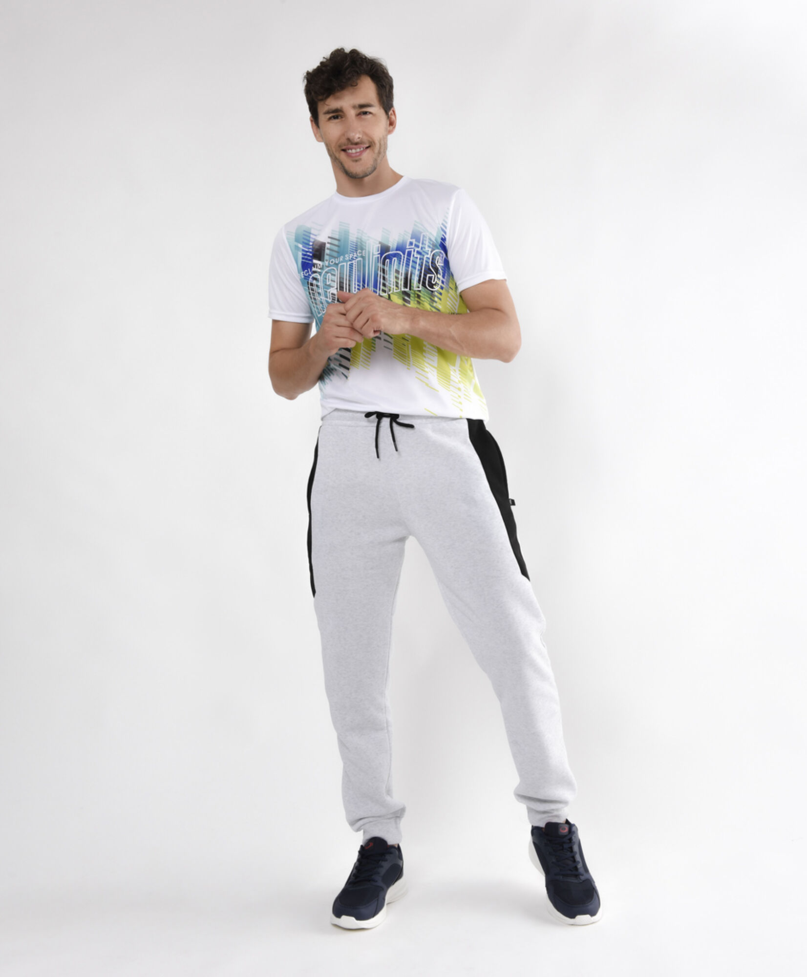 Pantalón de buzo hombre franjas frontales slim fit Pantalón de buzo hombre franjas frontales slim fit