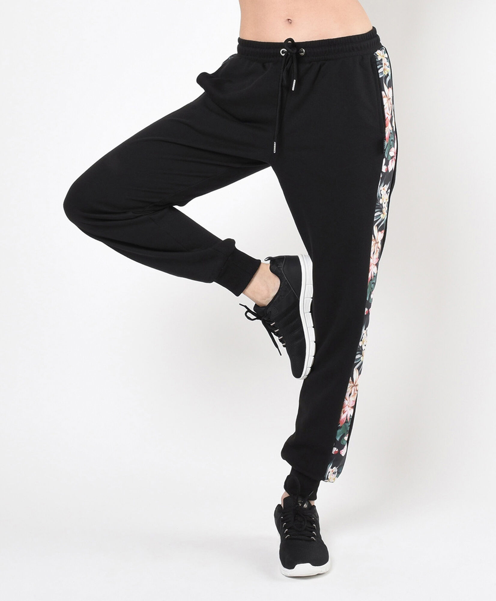 Pantalón de buzo mujer floreado lateral Pantalón de buzo mujer floreado lateral
