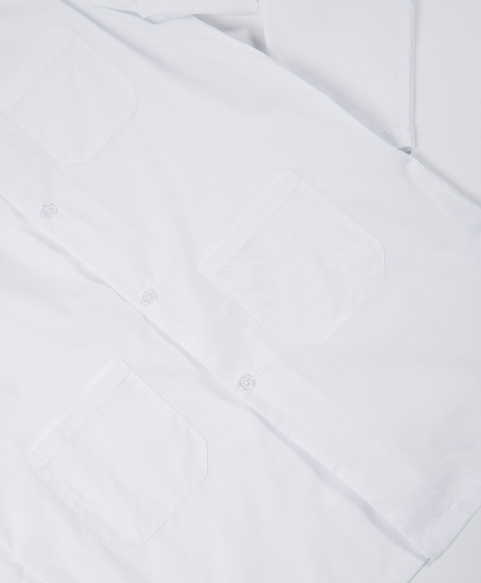 Delantal escolar blanco Delantal escolar blanco