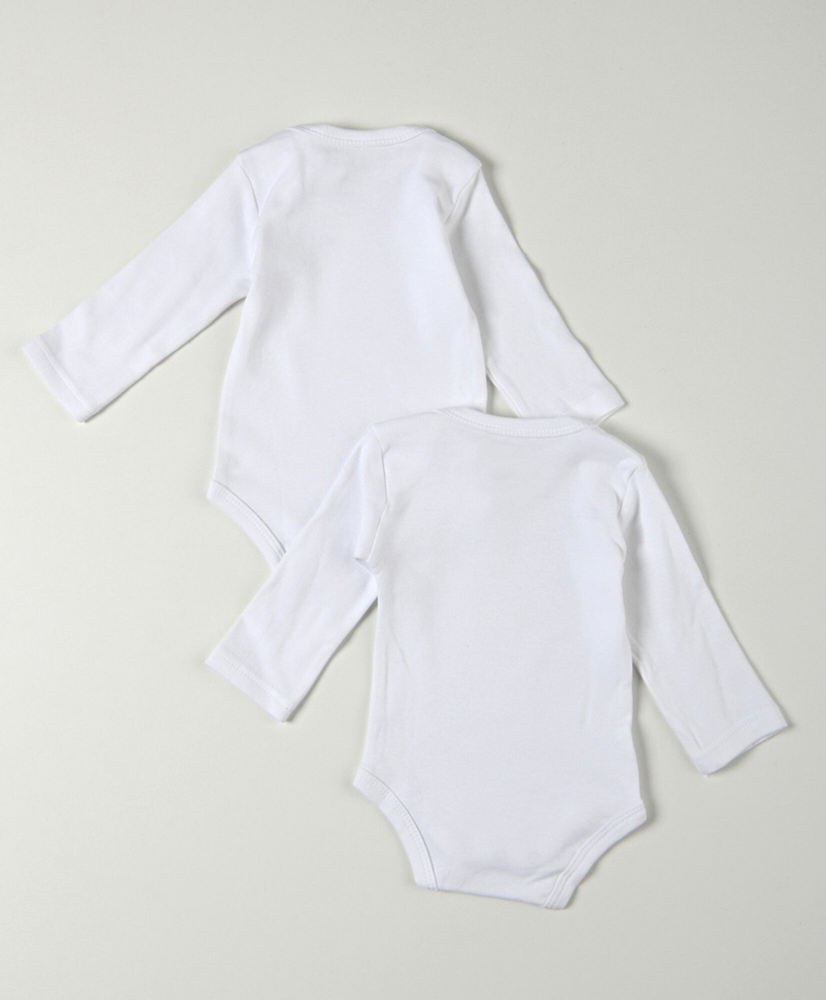 Pack 2 bodies bebé blancos manga larga Pack 2 bodies bebé blancos manga larga