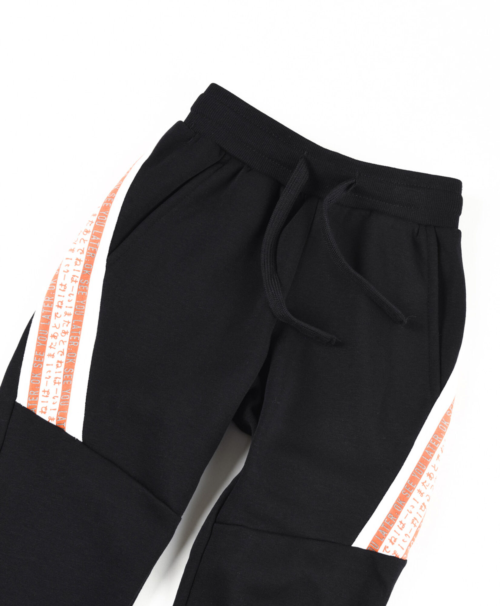 Pantalón de buzo niño cortes Pantalón de buzo niño cortes