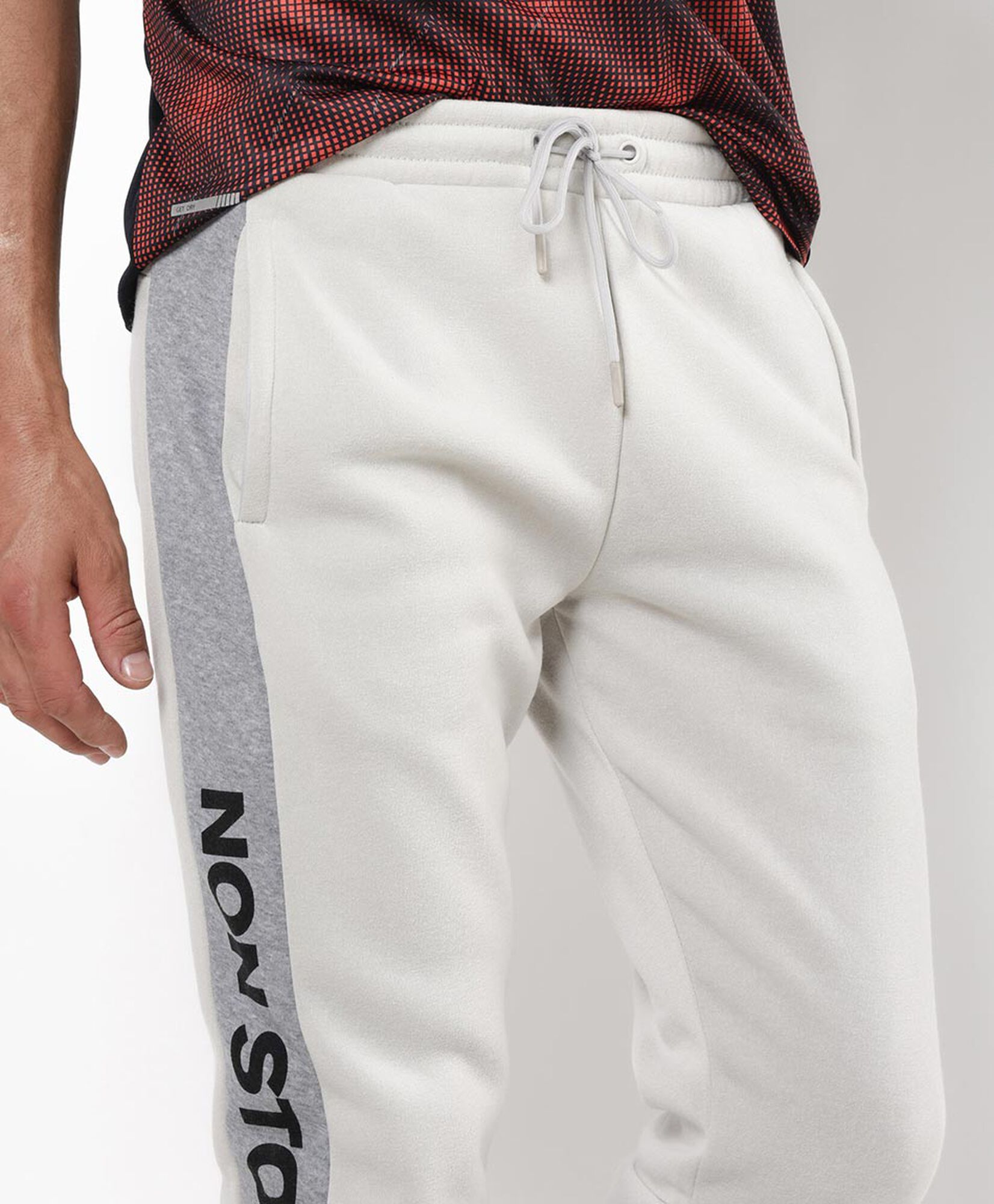 Pantalón de buzo hombre franjas laterales slim fit Pantalón de buzo hombre franjas laterales slim fit