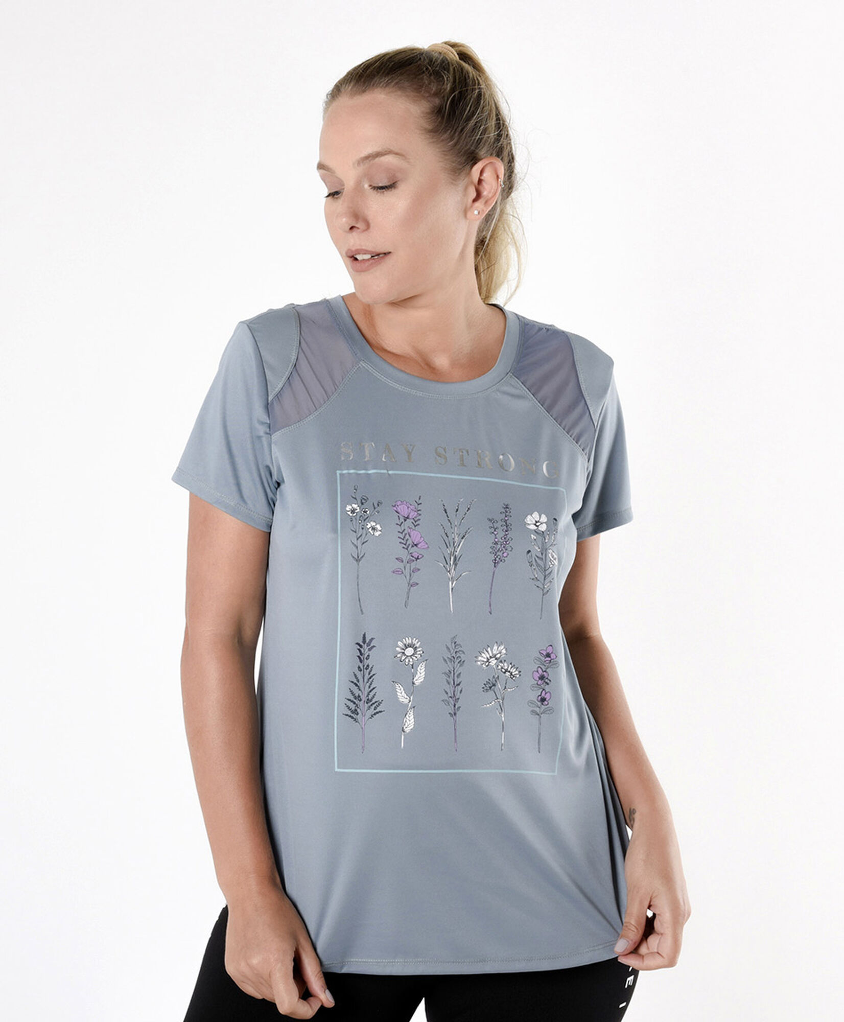 Polera deportiva mujer flores transparencias Polera deportiva mujer flores transparencias