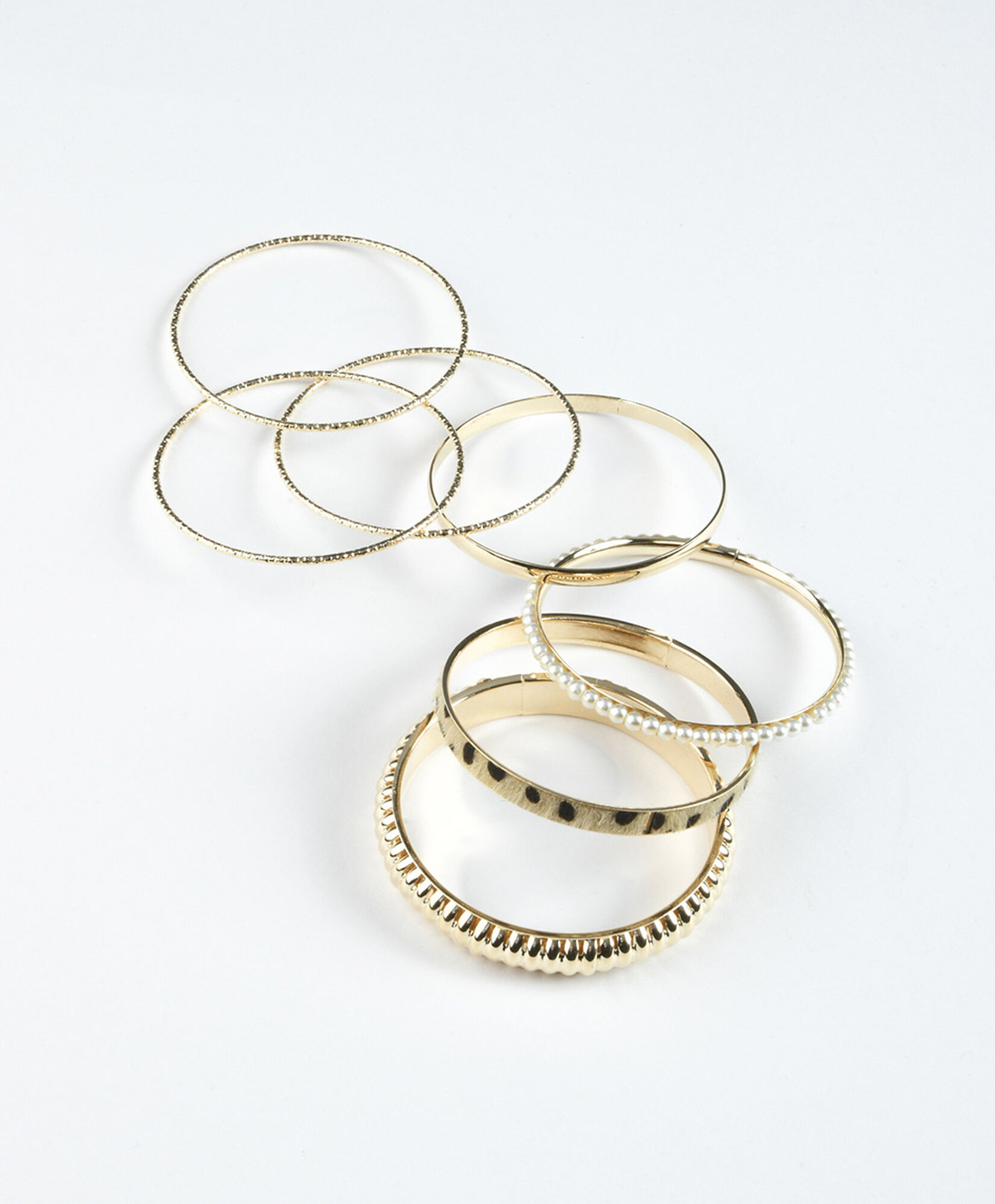 Set 7 pulseras mujer doradas Set 7 pulseras mujer doradas