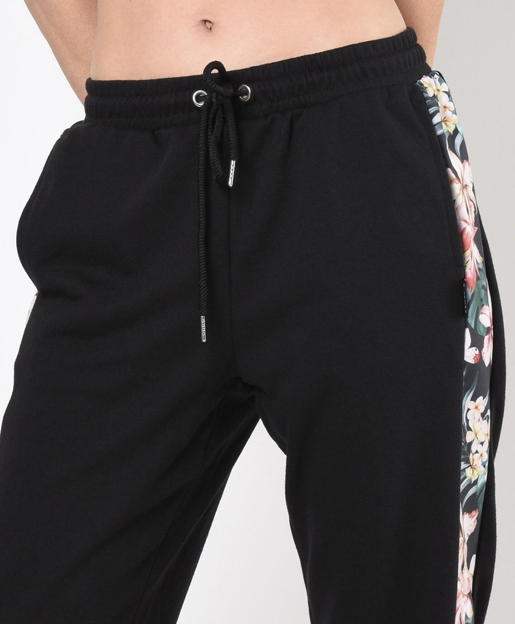 Pantalón de buzo mujer floreado lateral Pantalón de buzo mujer floreado lateral