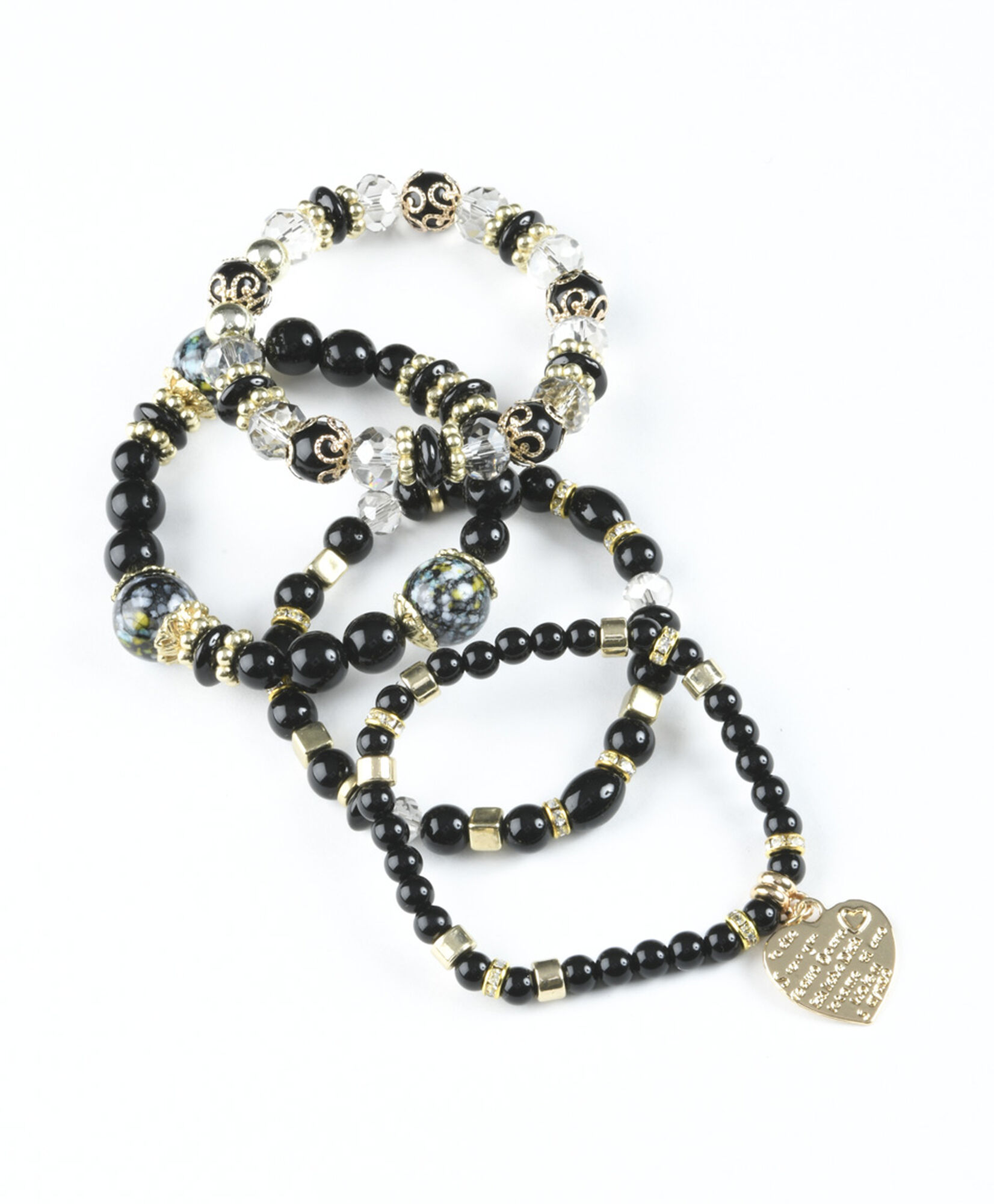 Set 4 pulseras mujer dijes negras Set 4 pulseras mujer dijes negras
