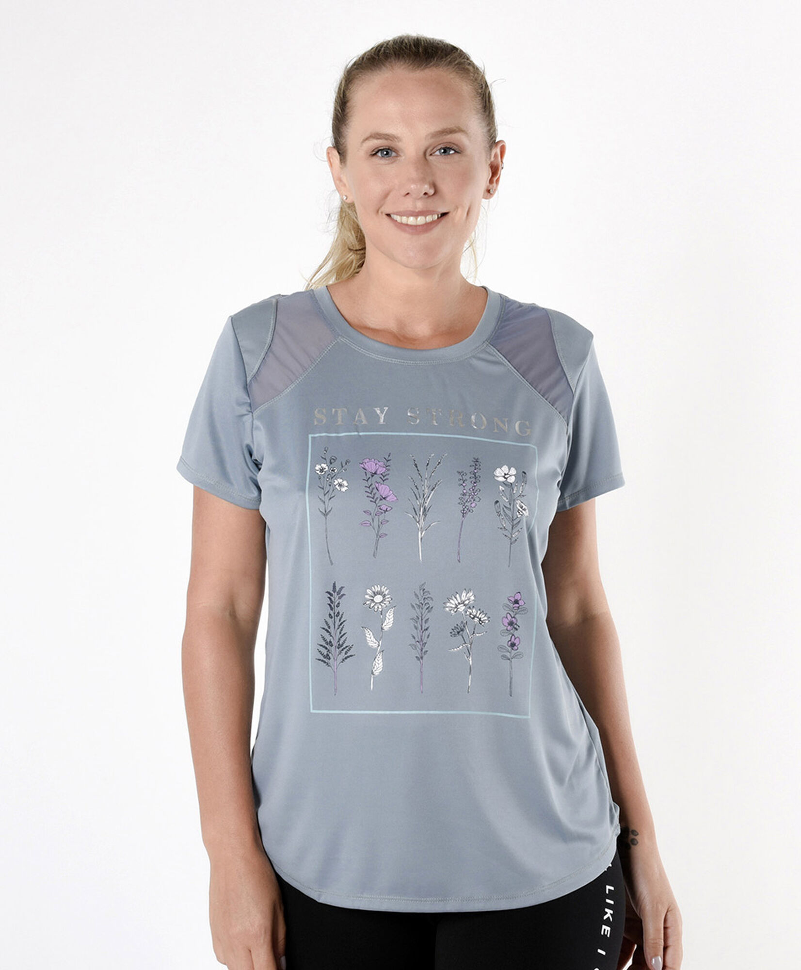 Polera deportiva mujer flores transparencias Polera deportiva mujer flores transparencias