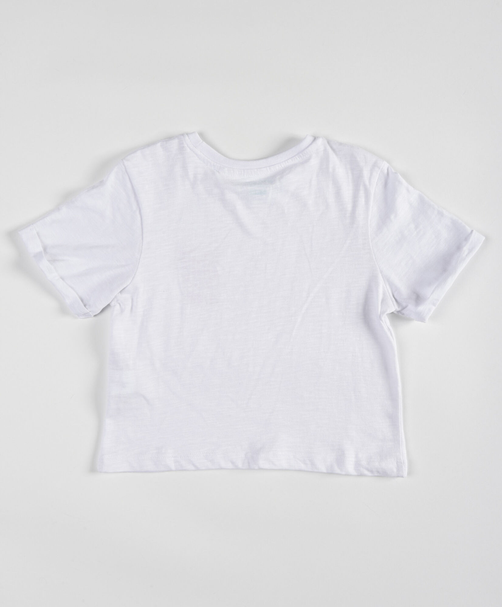 Polera niña frase crop Polera niña frase crop